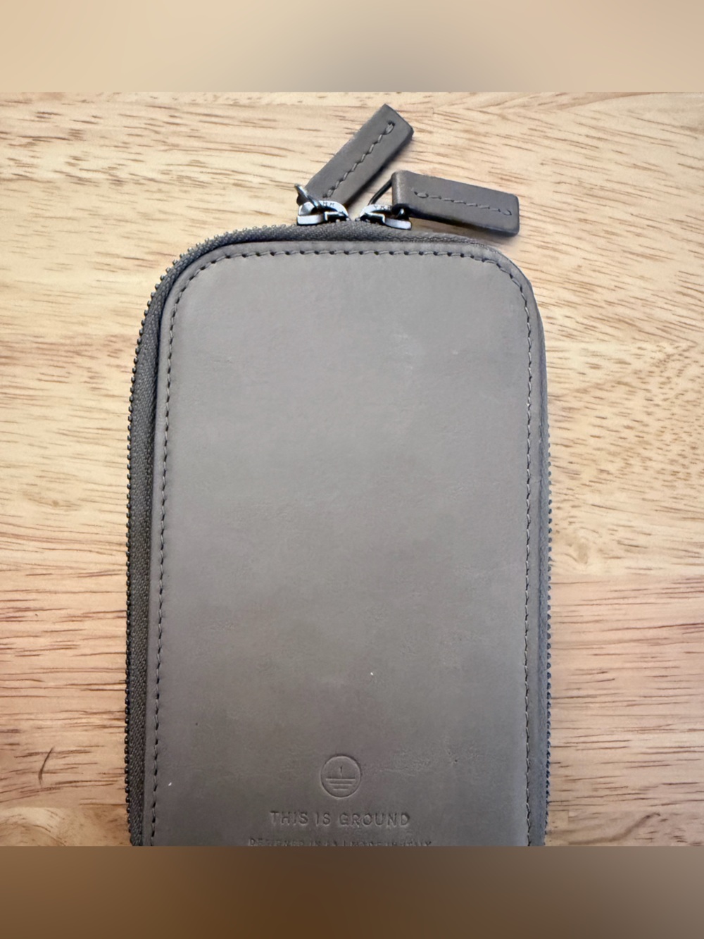 This is Ground Leather Zipper Pouch - Light Brown Gray